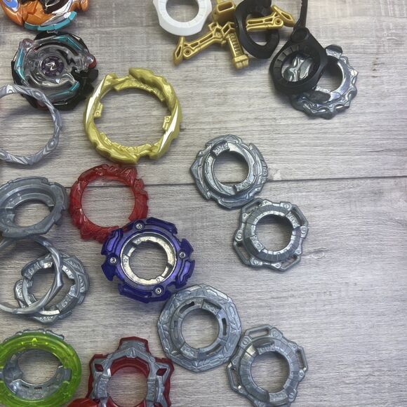 Assorted Large Lot of Beyblade Bay Blades Launchers Parts Metal & Plastic - Picture 10 of 14